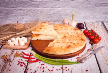 Осетинский пирог с творогом сыром и зеленью